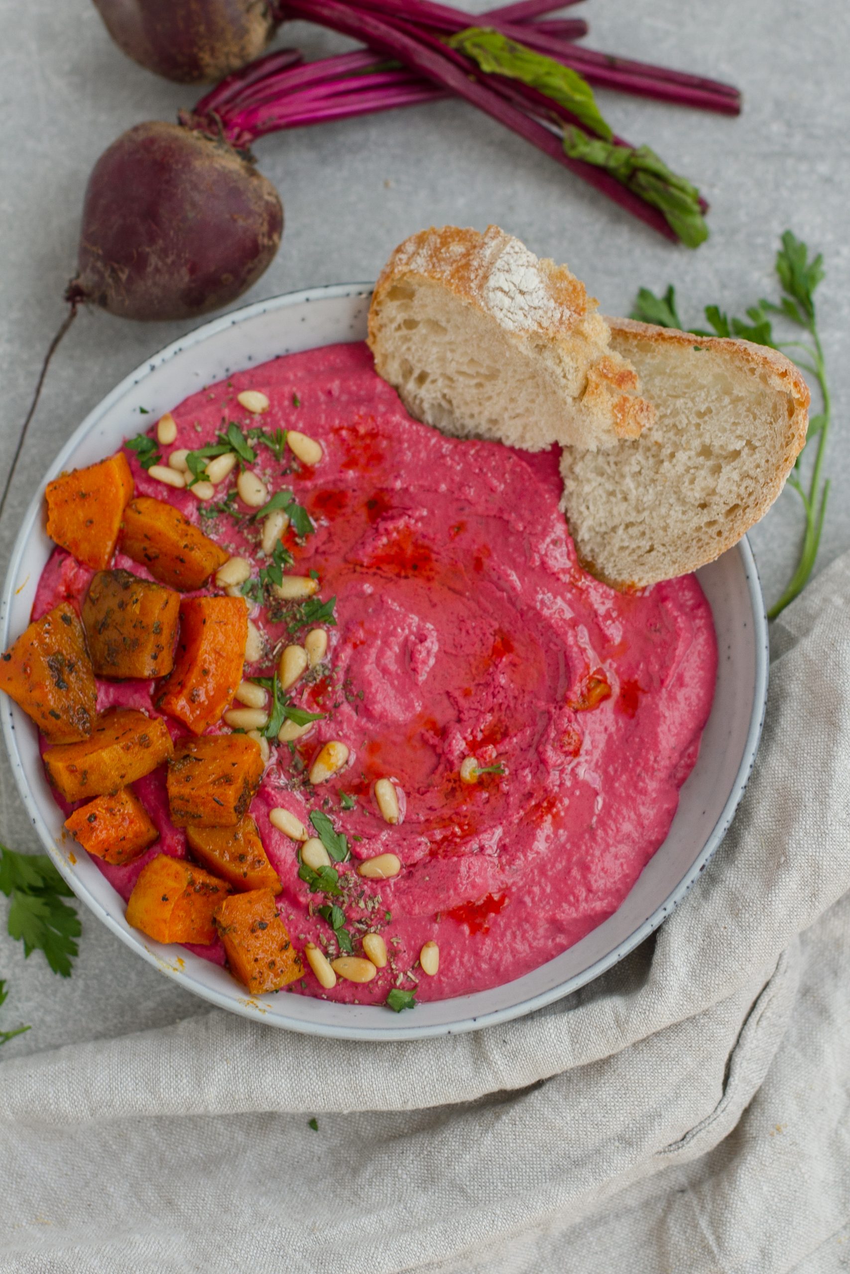 A delicious, creamy butternut squash and beet hummus. This easy hummus recipe is vegan, gluten-free, and made low-FODMAP by the use of garlic-infused olive oil